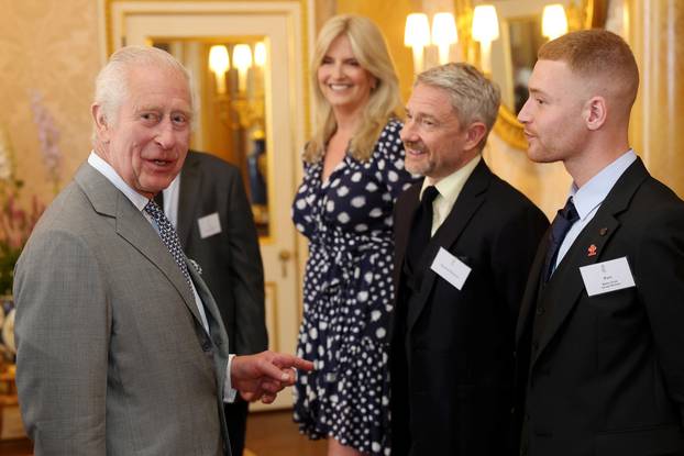 Britain's King Charles hosts winners of The Twentieth Prince's Trust Awards at Buckingham Palace, London