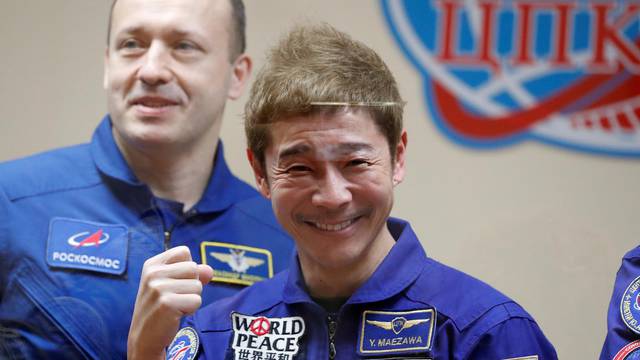 Space flight participant Yusaku Maezawa attends a meeting of the State Commission in Baikonur