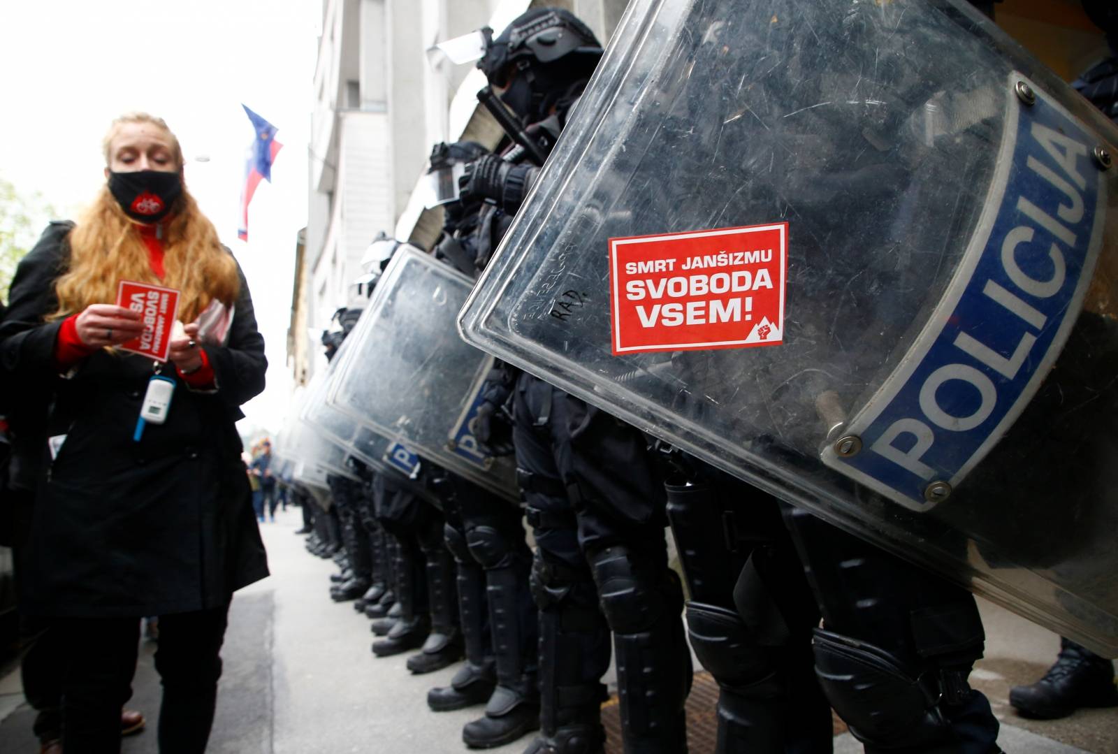 Demonstrators attend an anti-government protest in Ljubljana