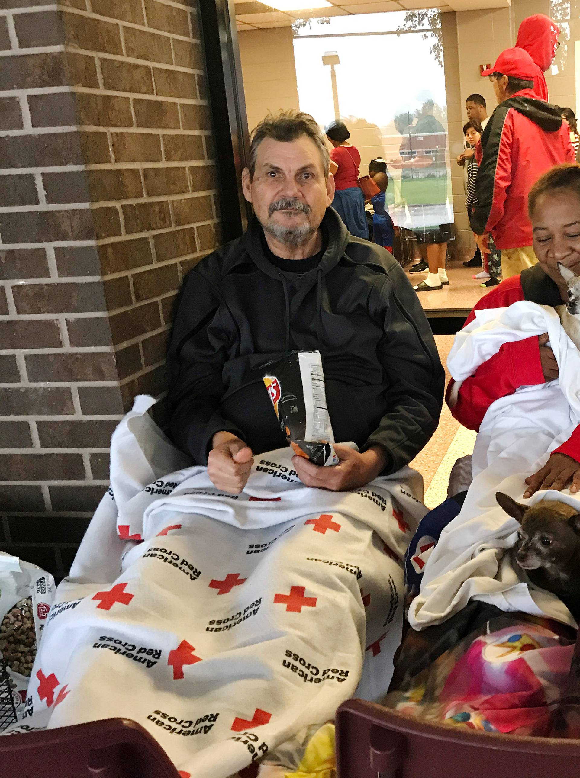 Kenneth and Minnie Bice prepare to sleep outside the M.O. Campbell Red Cross shelter in Aldine