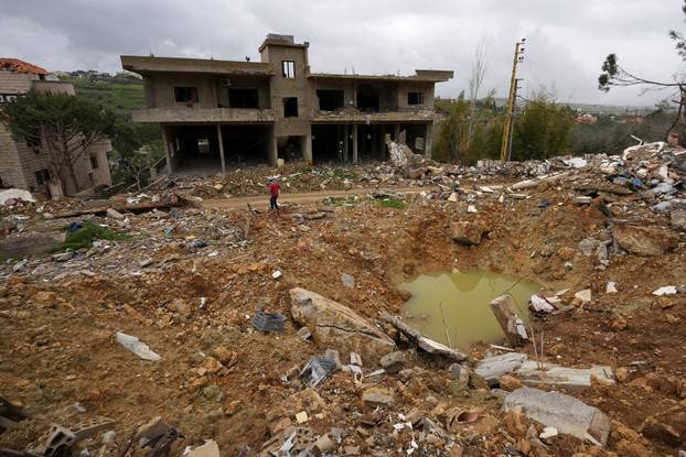 Scenes of destruction in the village of Debbine