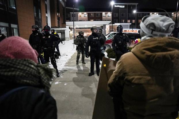 Protest outside the hotel where Bovino, who has been removed from his role, is reportedly staying, in Maple Grove