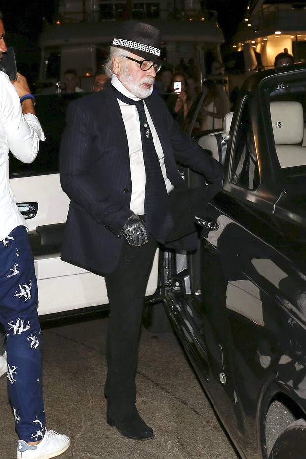 Karl Lagerfeld leaving Le Senequier in Saint Tropez