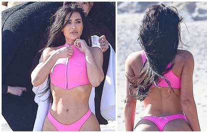 Kim Kardashian pokazala guzu bez filtera, pozirala je na plaži u ružičastim tangama i otkrila sve