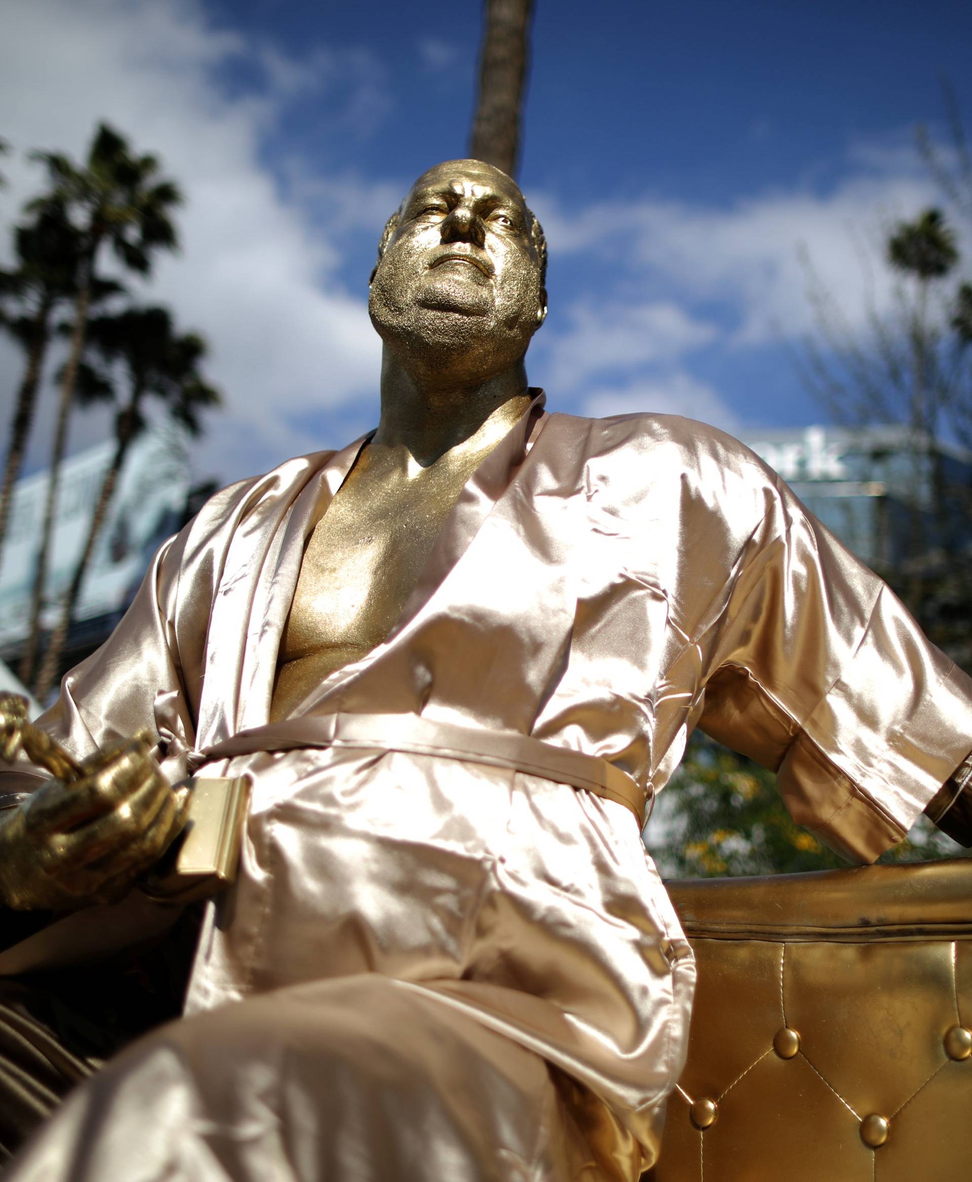 A statue of Harvey Weinstein on a casting couch made by artist Plastic Jesus is seen on Hollywood Boulevard near the Dolby Theatre during preparations for the Oscars in Hollywood, Los Angeles