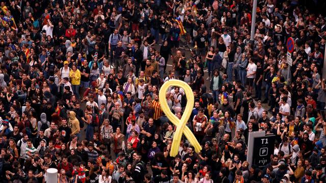 Protesters gather at Barcelona's airport, after a verdict in a trial over a banned independence referendum