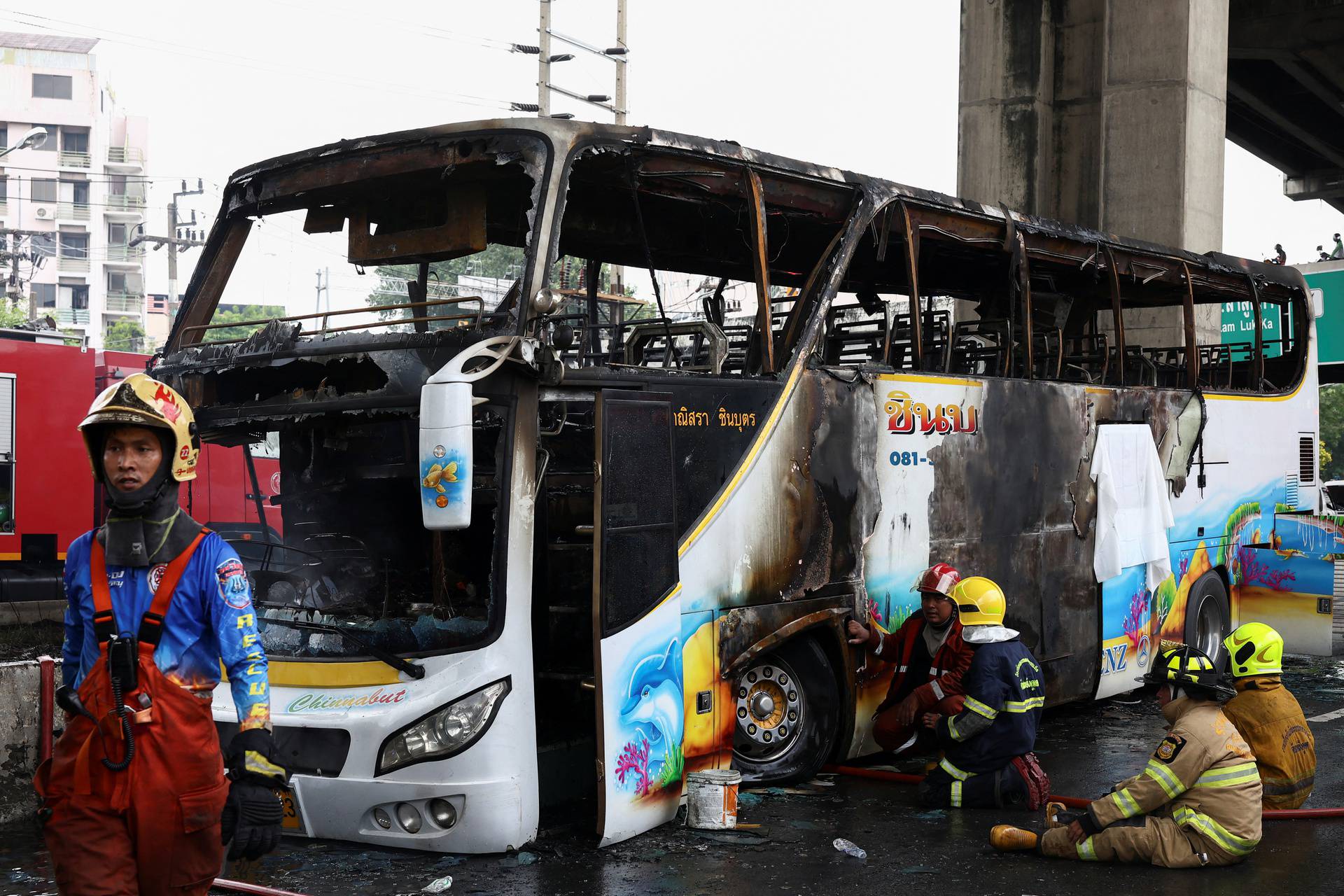 Rescue efforts after bus burns carrying teachers and students on outskirts of Bangkok