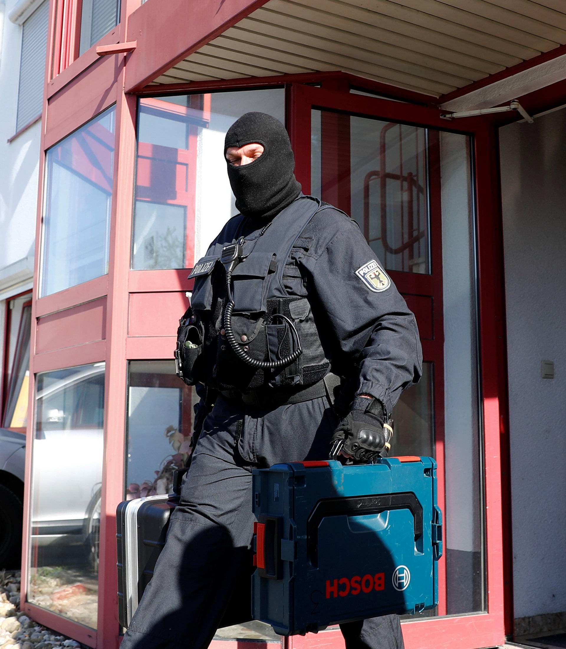 German police, which also involved Germany's GSG9 special operations police unit, raid sites across Germany