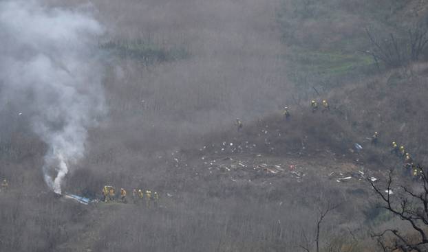 LA county firefighters on the scene of a helicopter crash that reportedly killed Kobe Bryant in Calabasas