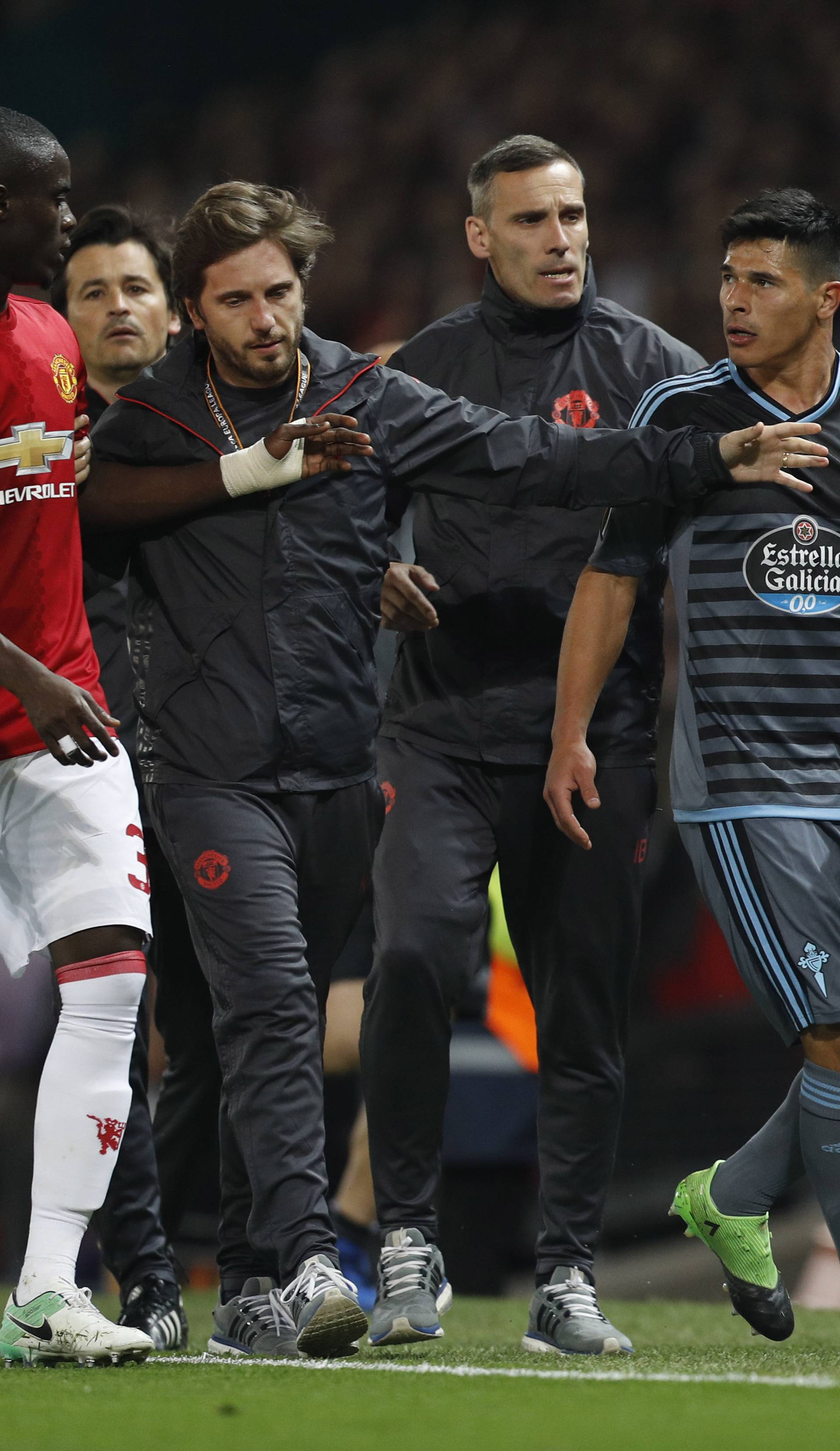 Manchester United's Eric Bailly clashes with Celta Vigo's Facundo Roncaglia after both are sent off