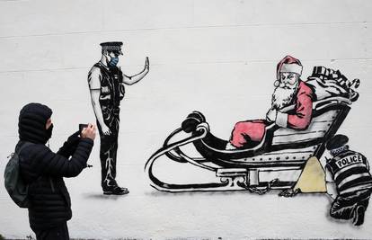 Novi prigodni grafit škotskog Banksyja: Restrikcije na putu smetaju čak i Djedu Božićnjaku