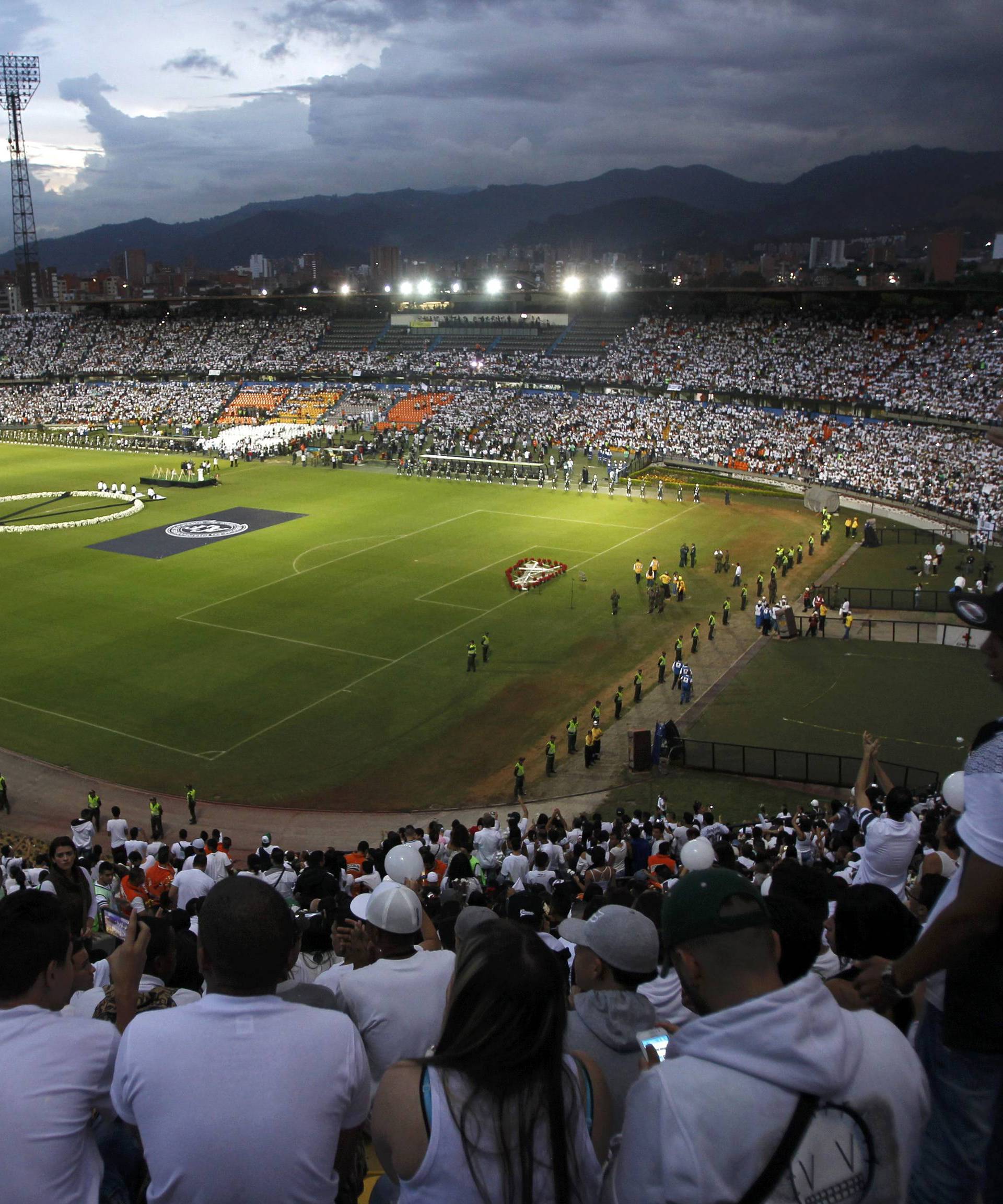 Fans of Atletico Nacional soccer club pay tribute to the players of Brazilian club Chapecoense killed in the recent airplane crash in Medellin