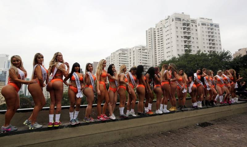 Miss BumBum Brazil 2016 pageant contestants pose before parading at Paulista Avenue in Sao Paulo's financial centre