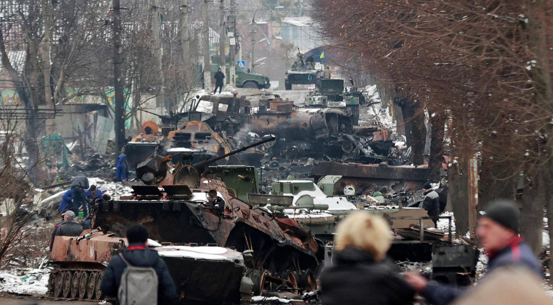 A view shows destroyed military vehicles on a street in Bucha