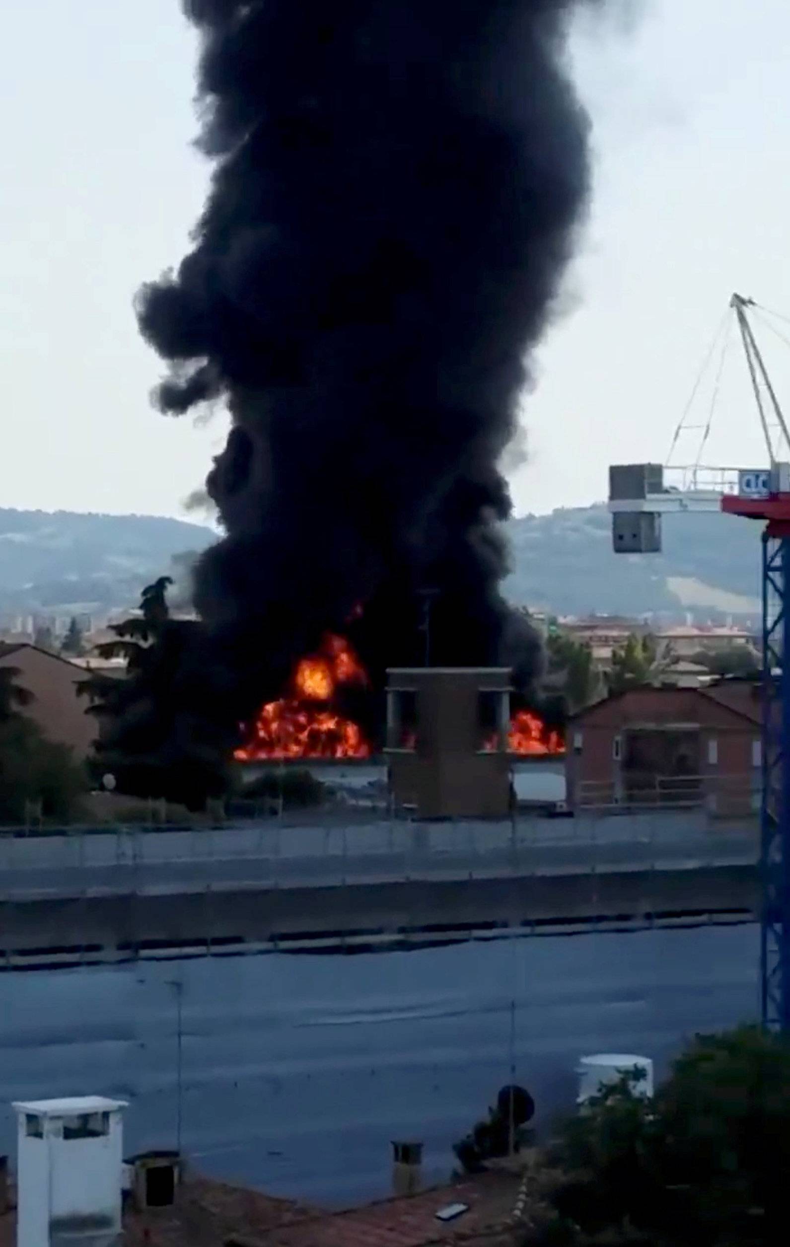 A fire is seen after an accident caused a large explosion at Borgo Panigale, on the outskirts of Bologna