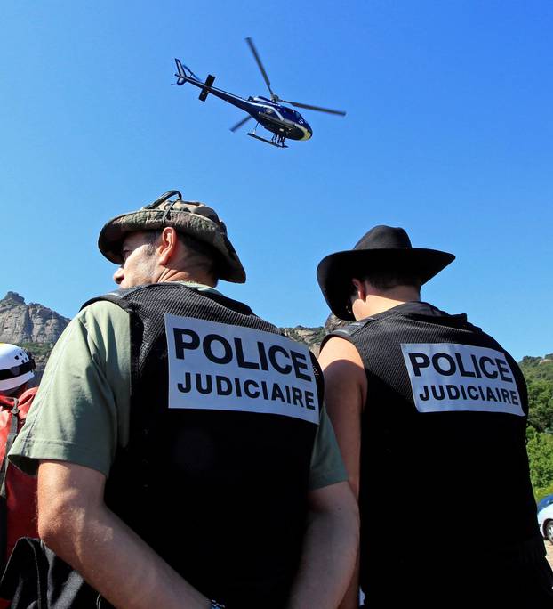 FILE PHOTO: French policemen take part to a research patrol in Roquebrune-sur-Argens