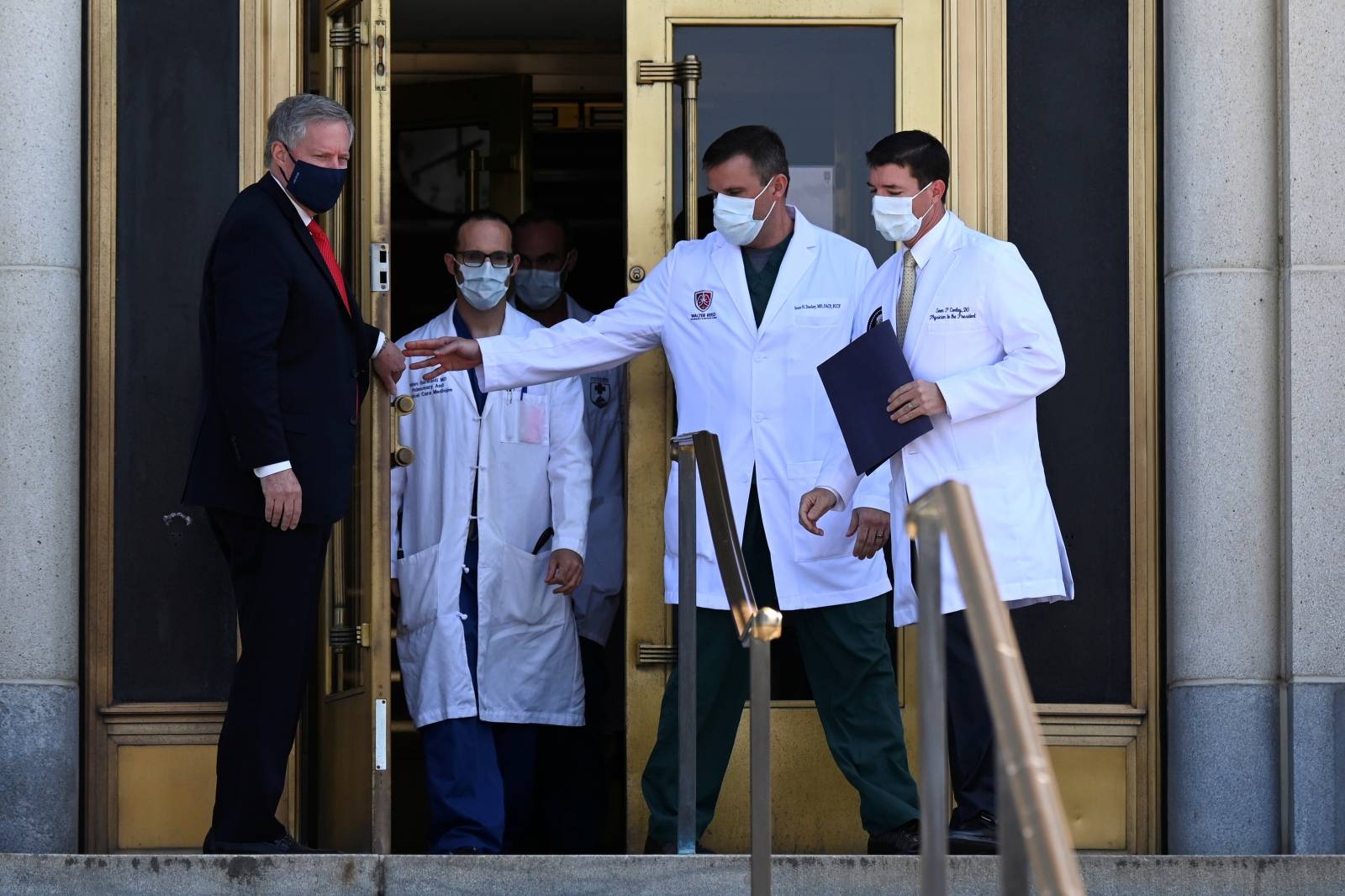 U.S. Navy Commander Dr. Sean Conley, the White House physician, arrives to speak about U.S. President Donald Trump's health, in Bethesda