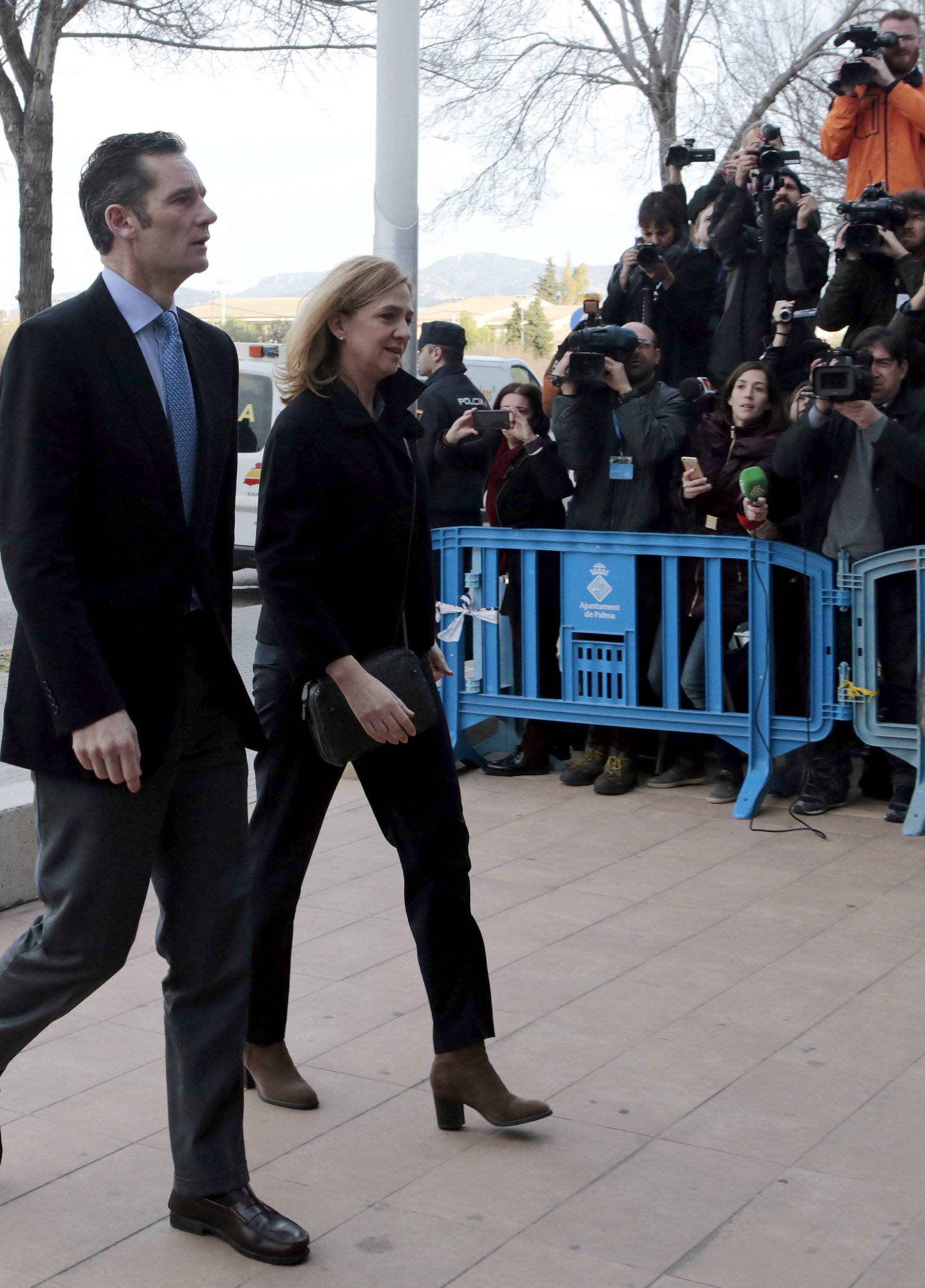 FILE PHOTO: Spain's Princess Cristina arrives at court with her husband Inaki Urdangarin to attend trial in Palma de Mallorca