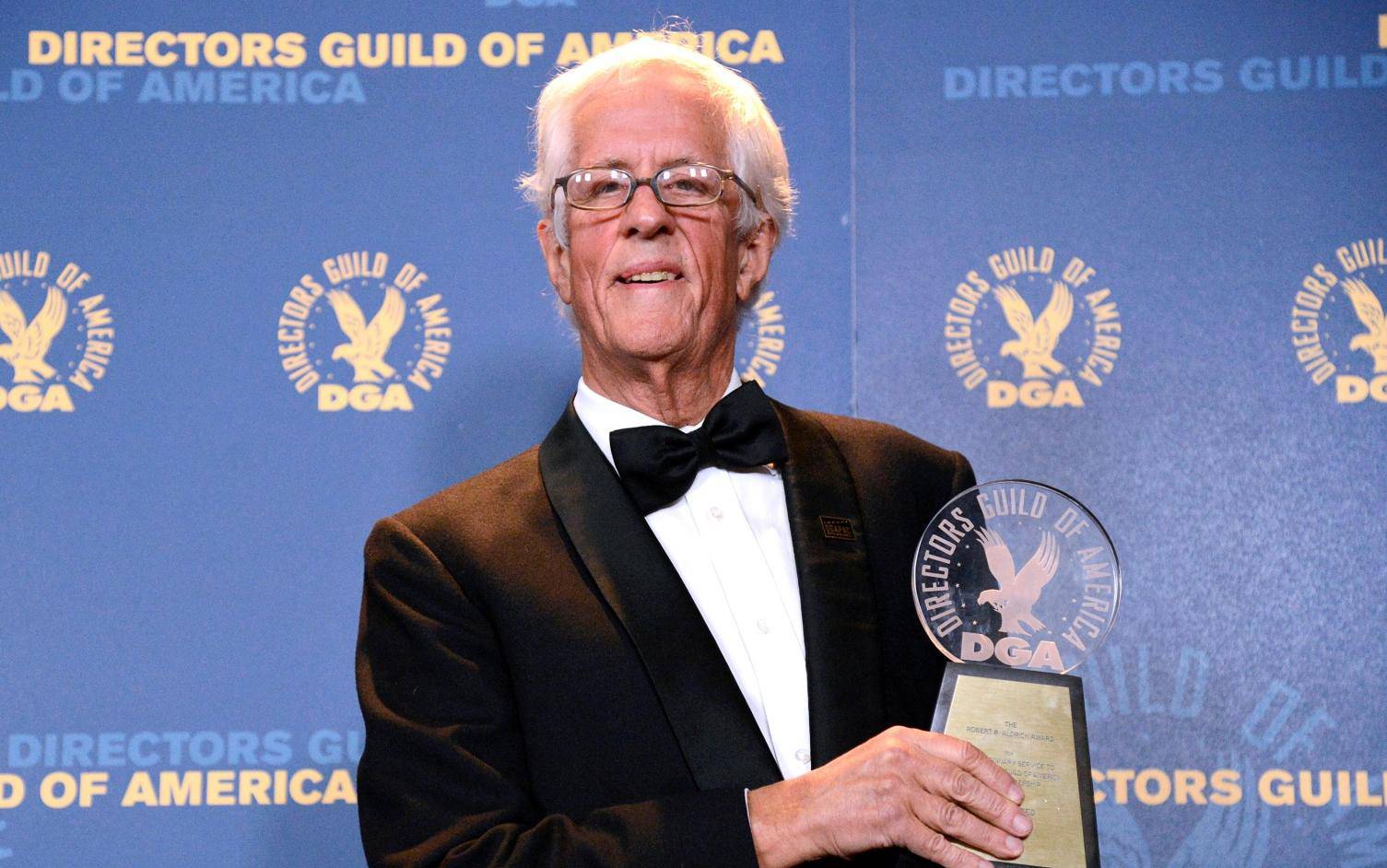 FFILE PHOTO: Aldrich Award recipient Michael Apted poses at the 65th annual Directors Guild of America Awards in Los Angeles, California