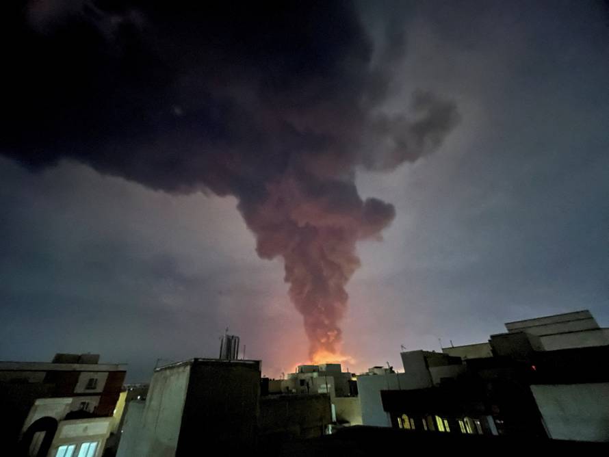 Smoke rises following an explosion, amid the U.S.-Israeli conflict with Iran, in Tehran