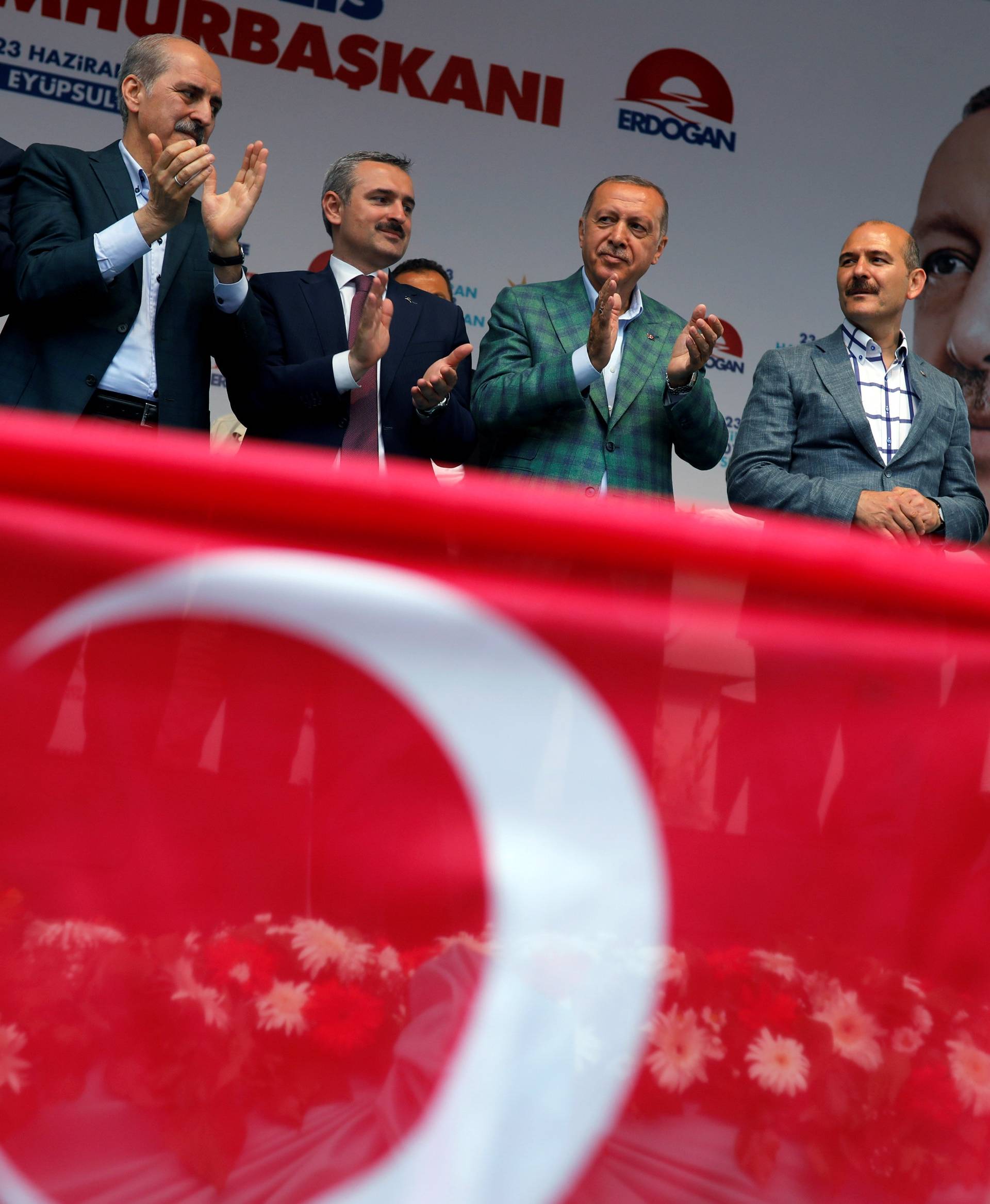 Turkish President Tayyip Erdogan reacts during an election rally in Istanbul