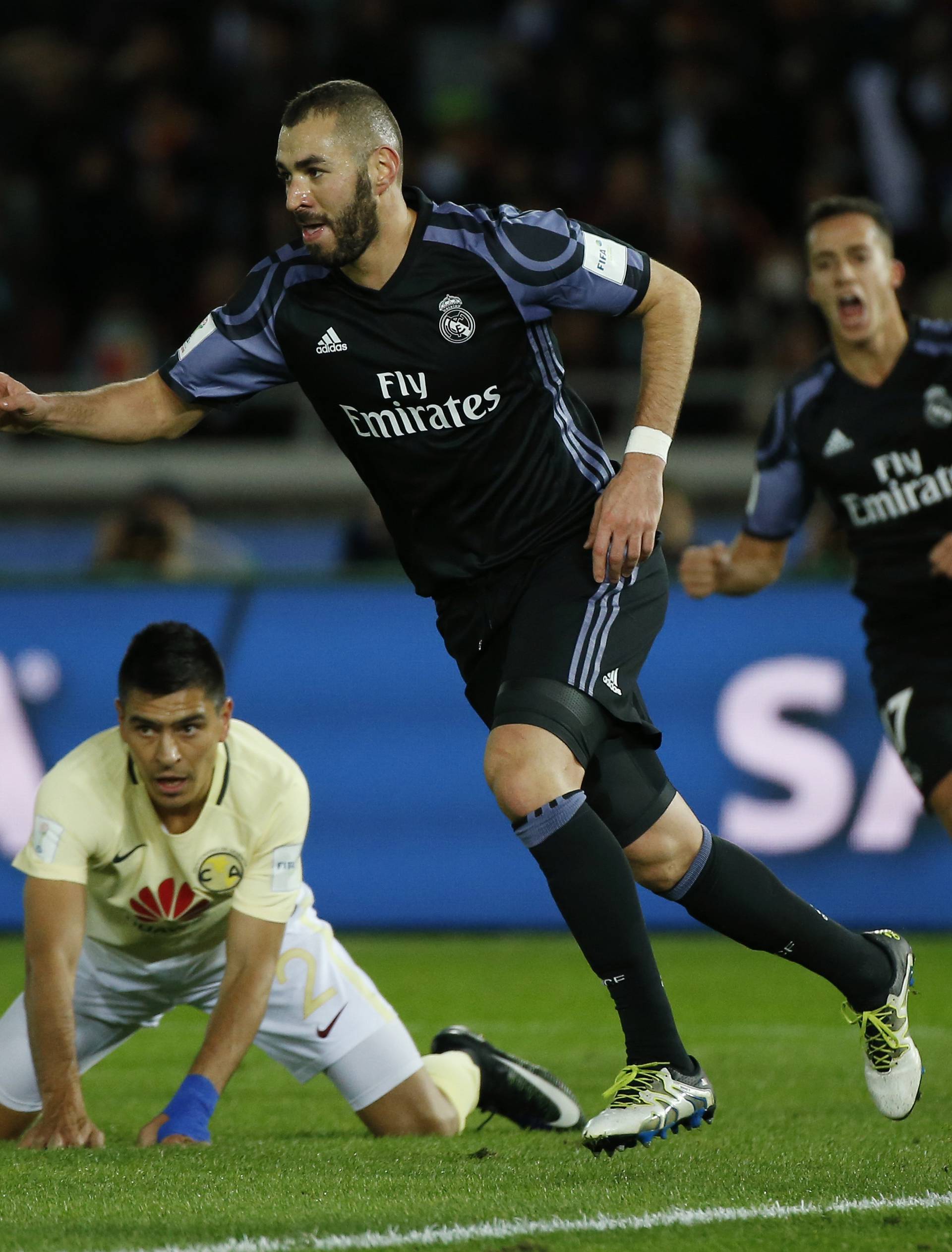 Real Madrid's Karim Benzema celebrates scoring their first goal