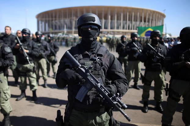 Brazilian police and special military forces stand outside the Mane Garrincha Stadium in Brasilia
