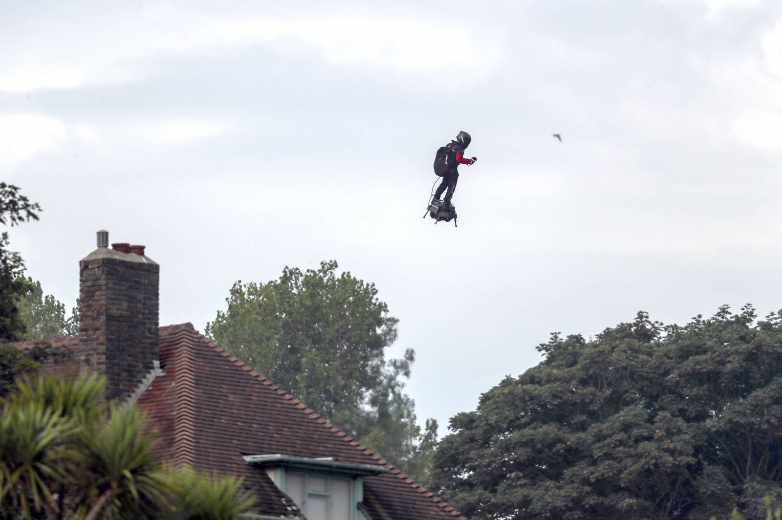 Jet-powered hover-board channel crossing