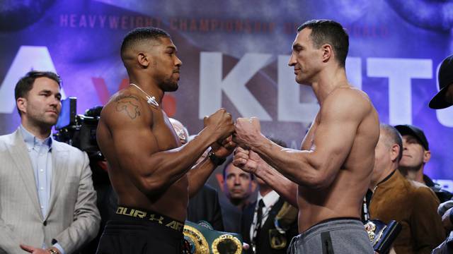 Anthony Joshua and Wladimir Klitschko go head to head during the weigh-in