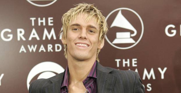 FILE PHOTO: Singer Aaron Carter arrives at the 47th annual Grammy Awards.