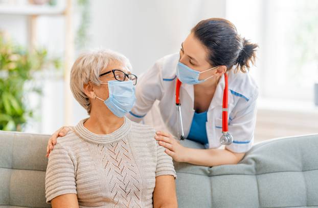 Doctor,And,Senior,Woman,Wearing,Facemasks,During,Coronavirus,And,Flu