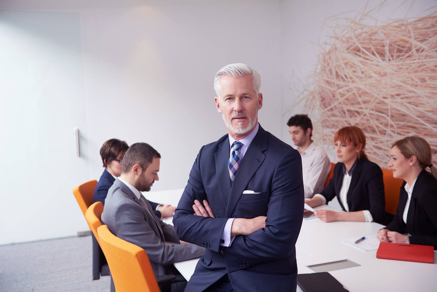 senior business man with his team at office