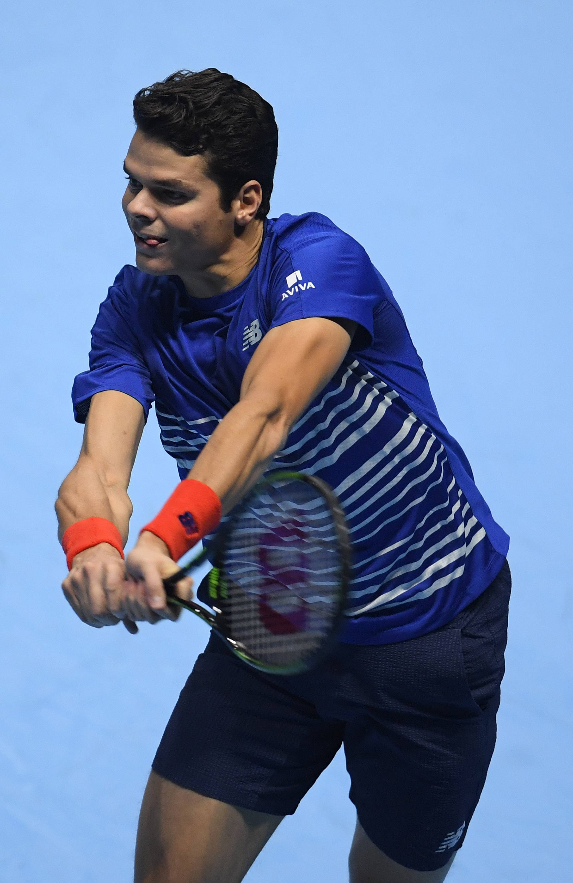 Canada's Milos Raonic in action during his round robin match with Austria's Dominic Thiem