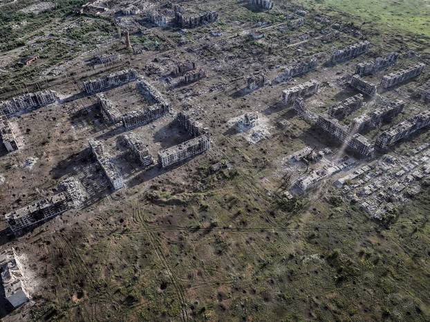 A drone view shows destroyed buildings in the frontline town of Chasiv Yar