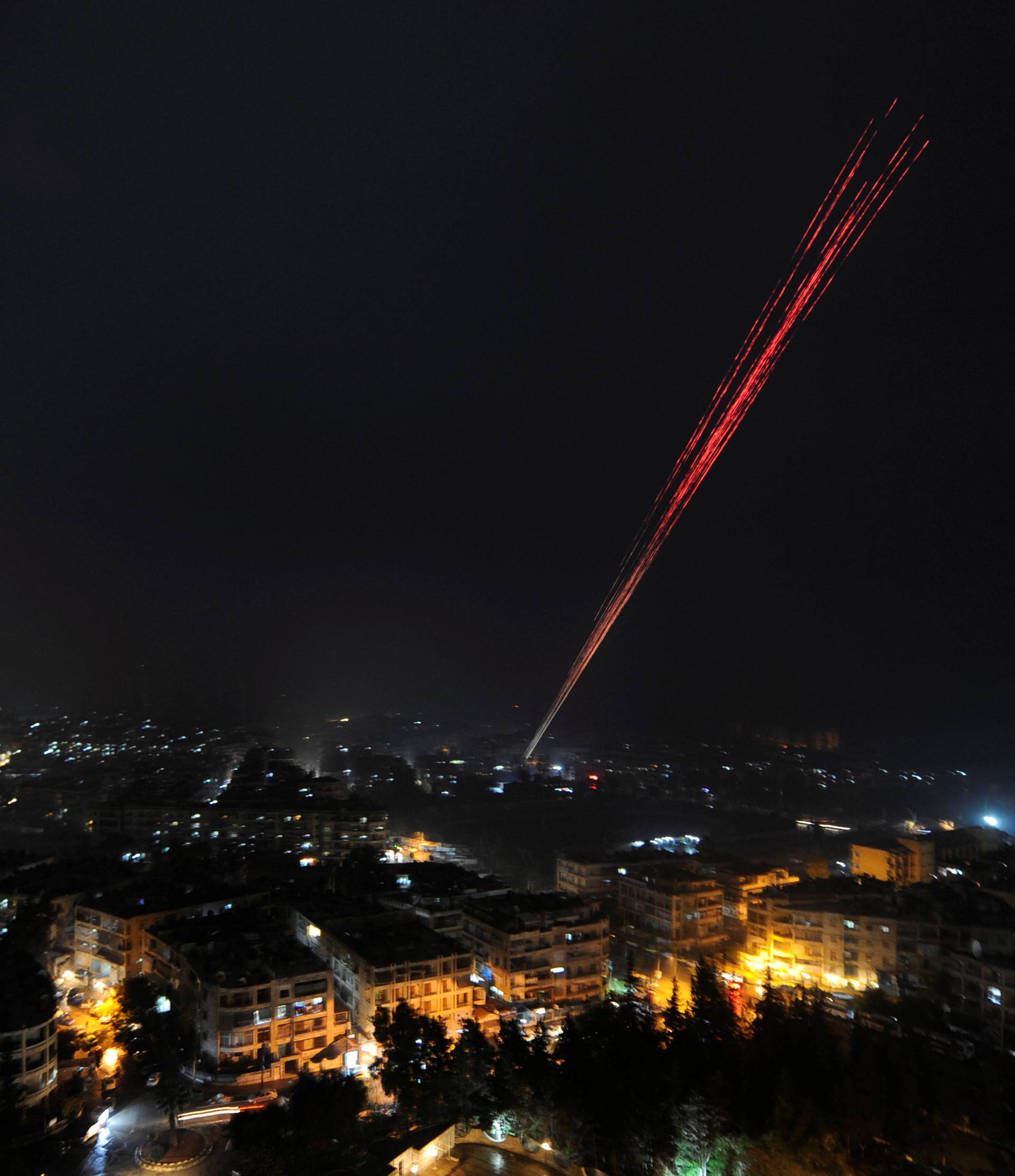  Govermental Syrian forces fires into sky as celebrating their victory against rebels in eastern Aleppo