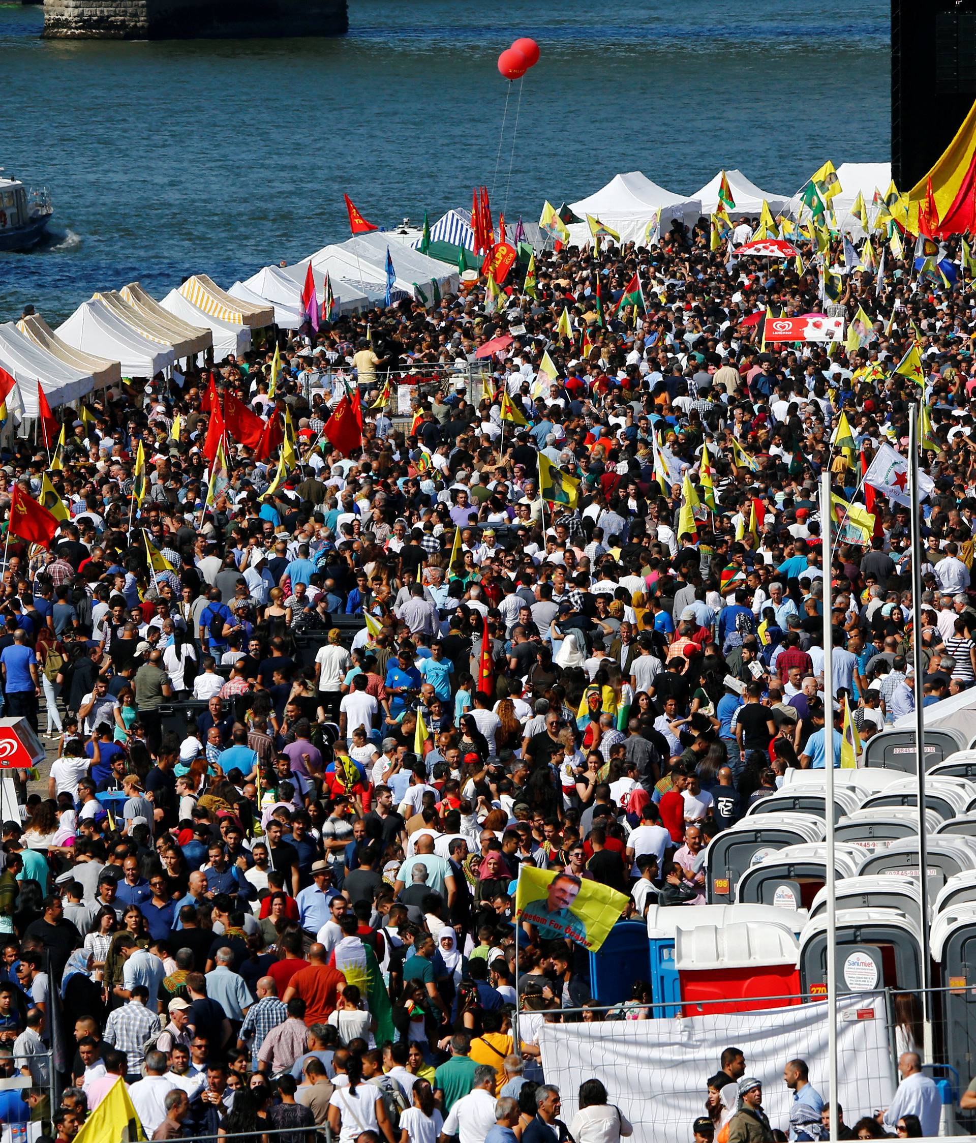 Thousands of Kurdish Turks gather to protest against Turkish President Tayyip Erdogan at a rally in Cologne