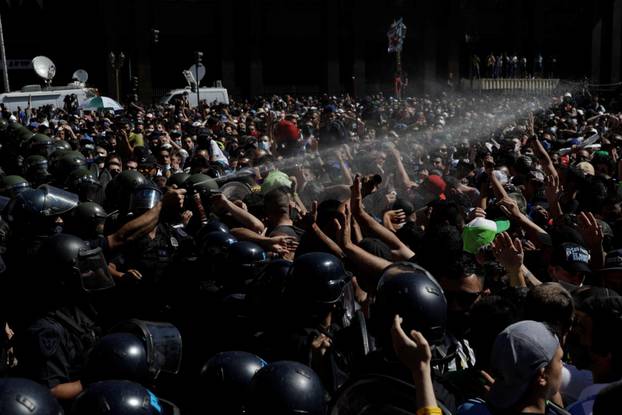 People gather to mourn the death of soccer legend Diego Armando Maradona, in Buenos Aires