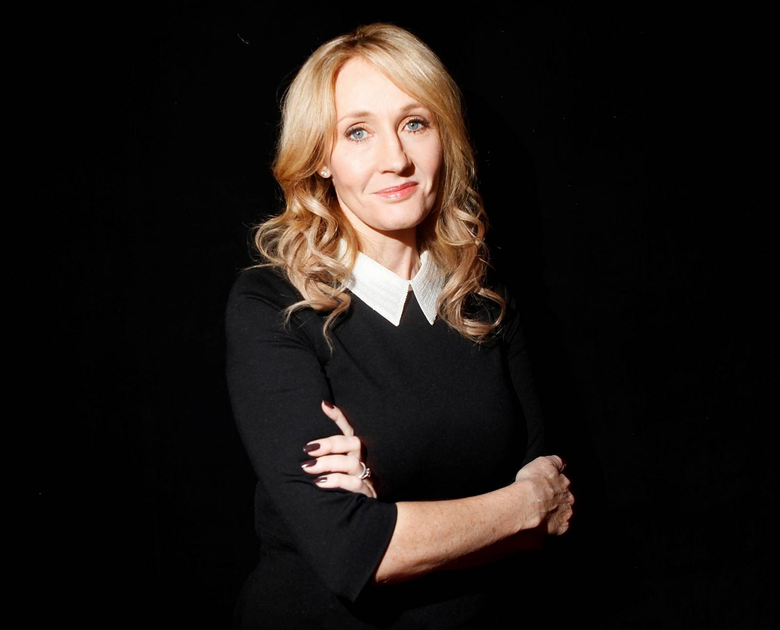 FILE PHOTO: Author Rowling poses for a portrait while publicizing her adult fiction book "The Casual Vacancy" in New York