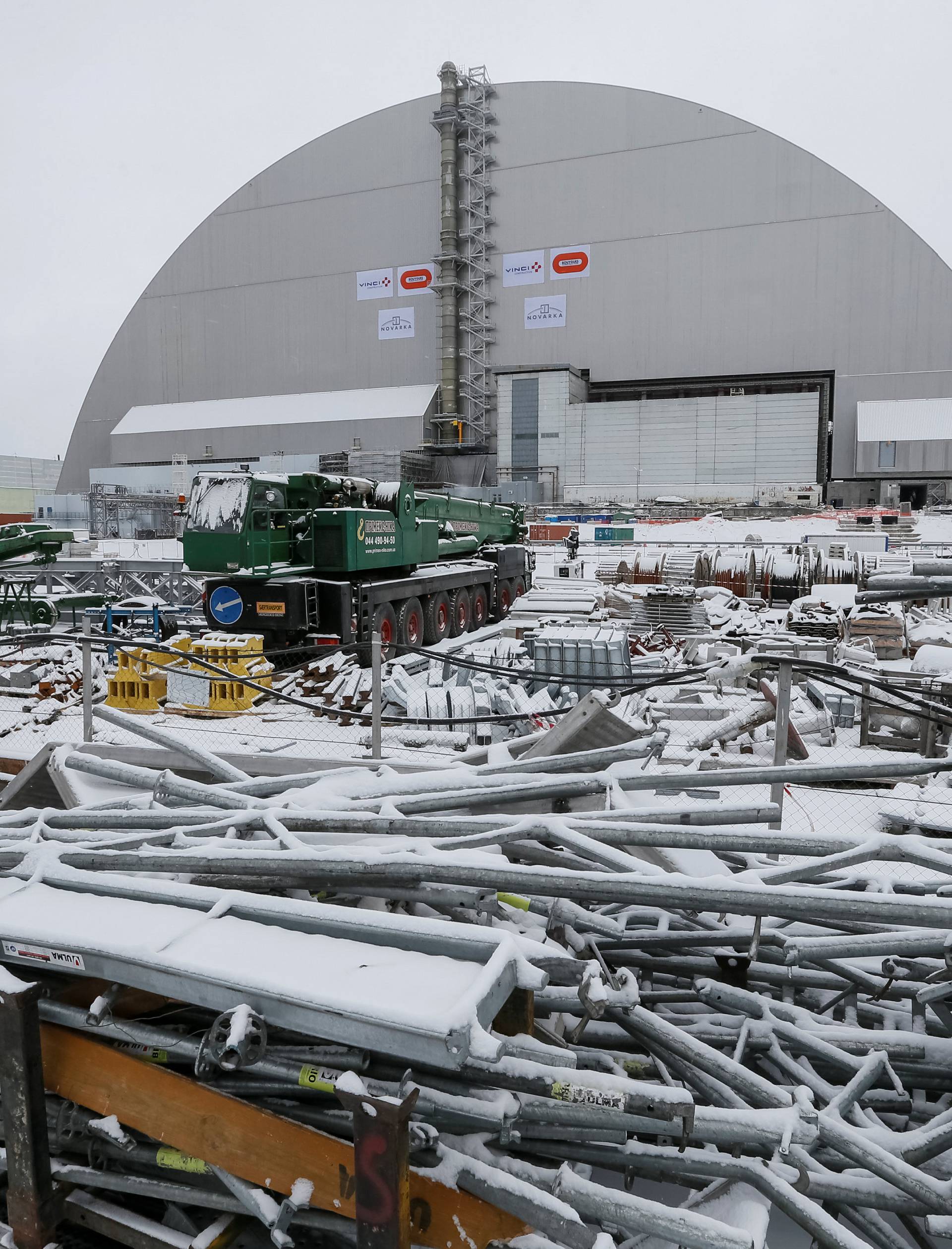 A general view shows a New Safe Confinement (NSC) structure over the old sarcophagus covering the damaged fourth reactor at the Chernobyl nuclear power plant, in Chernobyl