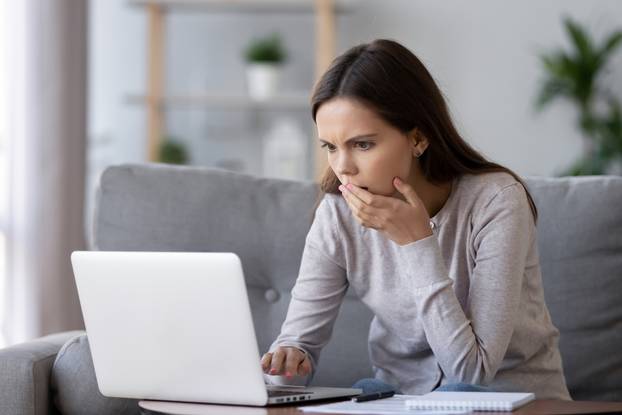 Shocked,Stressed,Young,Woman,Reading,Bad,Online,News,Looking,At