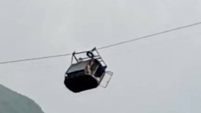 A view shows cable car carrying students stranded mid-air in Battagram