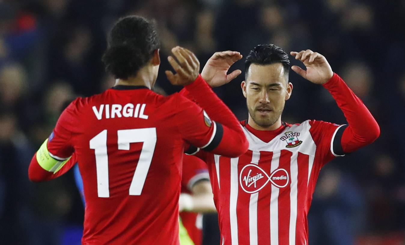 Southampton's Virgil van Dijk and Maya Yoshida celebrate after the match