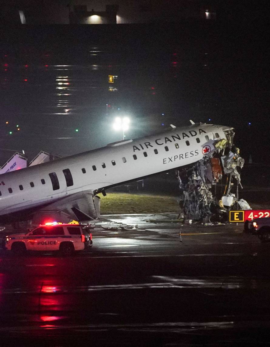 Air Canada Express jet collides with a ground vehicle at LaGuardia airport