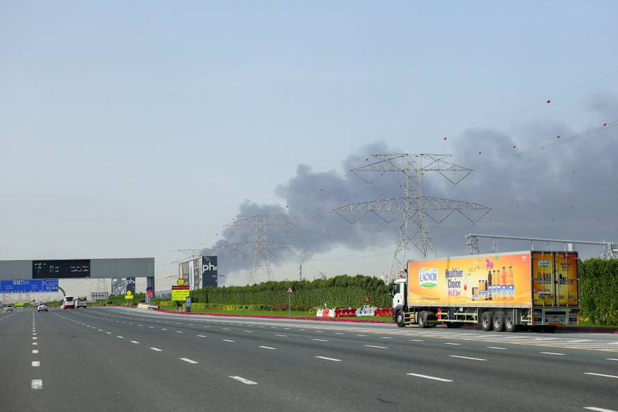 Smoke billows from Jebel Ali port after an Iranian attack, following United States and Israel strikes on Iran, in Dubai