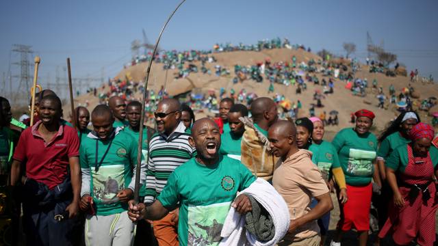 FILE PHOTO: Miners and members of the Association of Mineworkers and Construction Union (AMCU) sing during the 5th-year anniversary commemorations in Rustenburg