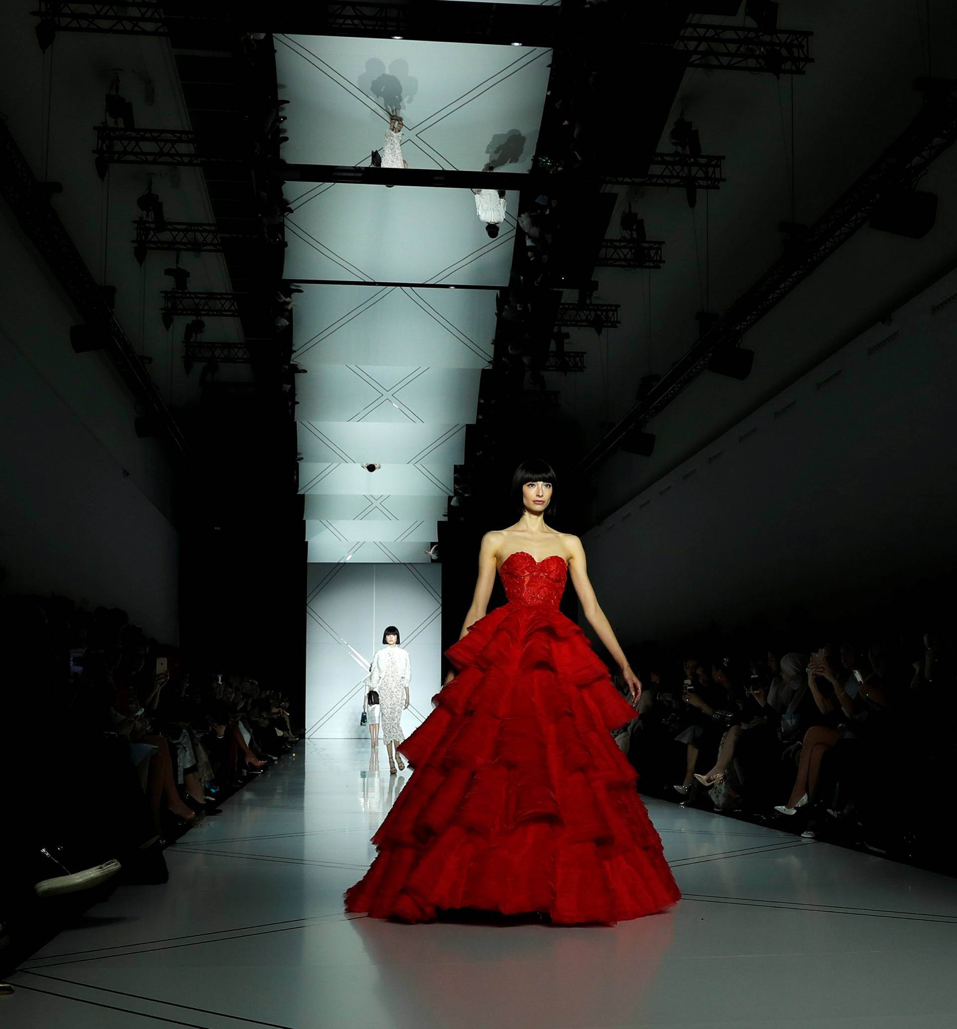 A model presents a creation by Australian designers Tamara Ralph and Michael Russo as part of their Haute Couture Spring/Summer 2017 fashion show for Ralph & Russo in Paris