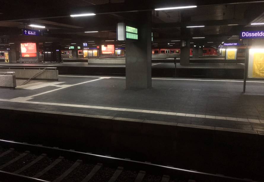 A picture taken out of a train shows empty platforms at Dusseldorf train station