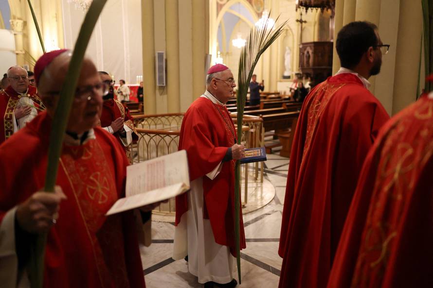 Cancellation of the traditional Palm Sunday procession from the Mount of Olives to Jerusalem, amid restrictions on gathering in large groups and the U.S.-Israel conflict with Iran