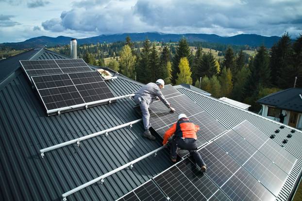 Electricians,Building,Photovoltaic,Solar,Module,Station,On,Roof,Of,House.