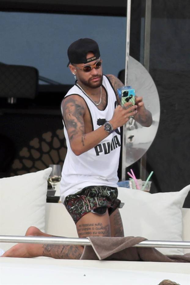 Brazilian and PSG superstar footballer Neymar spotted on his pre-season Spanish break with a group of friends on his luxury yacht out in Formentera.